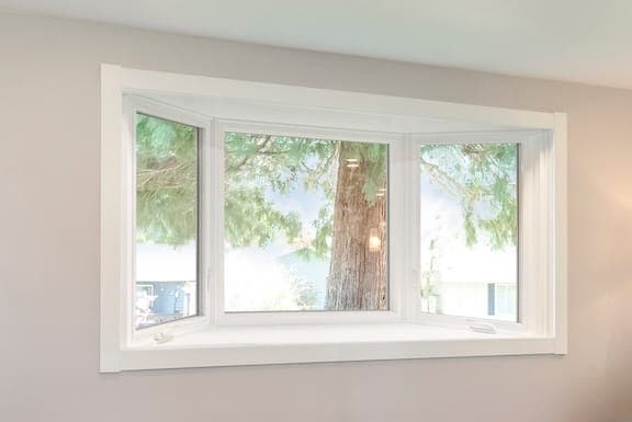 Interior of a residential bay window with multiple insulated glass units