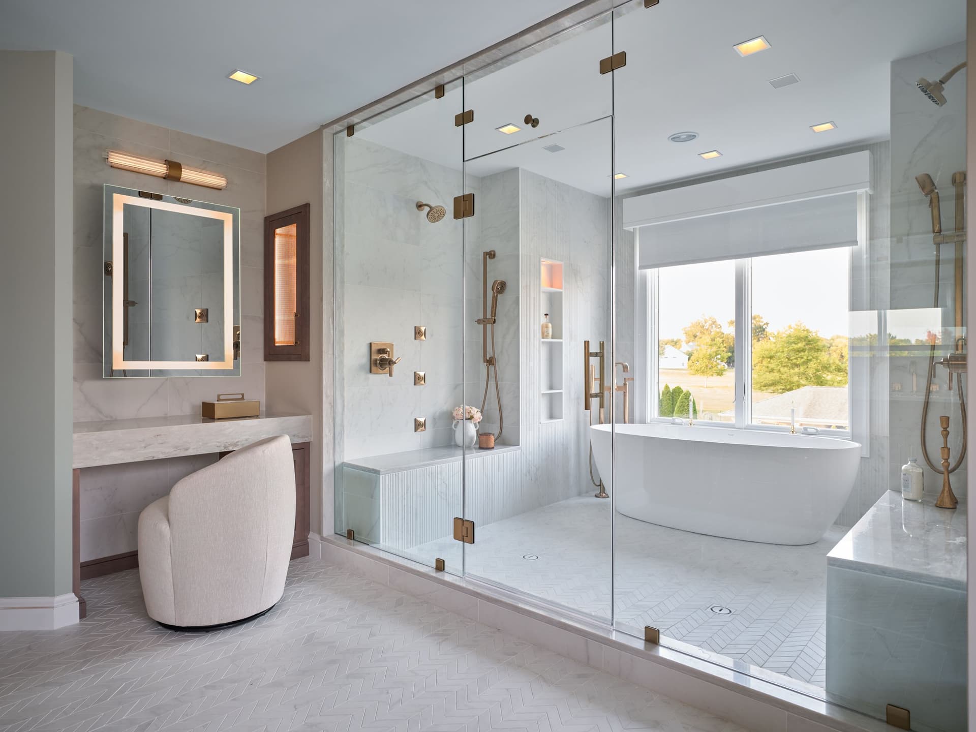 bathroom with window and tub inside glass wall and door