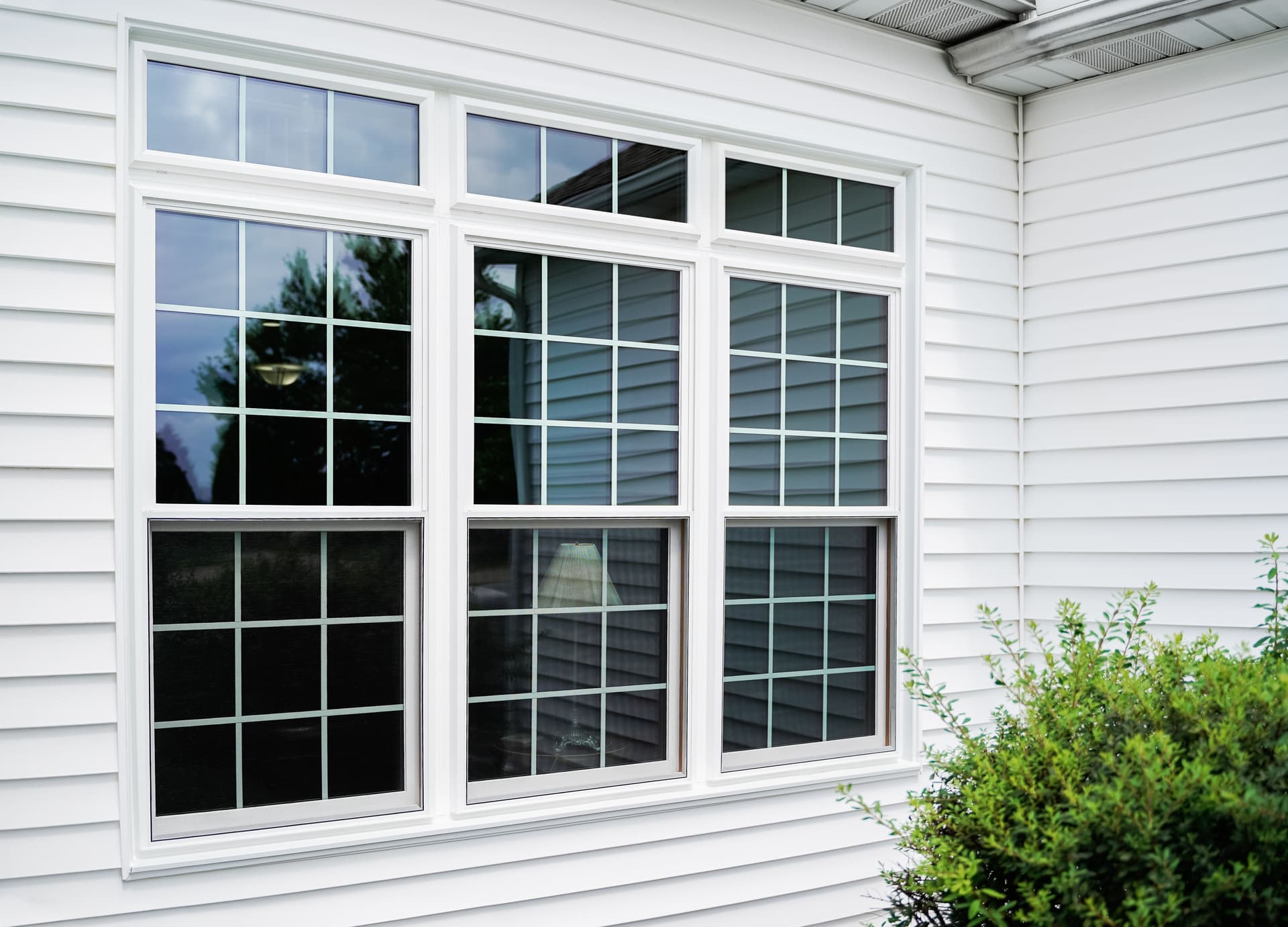 Double-pane double-hung and picture windows in a South Jersey home.